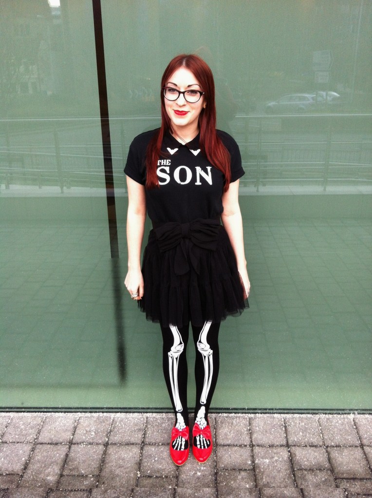 Honor Clement-Hayes wearing The SON band tshirt