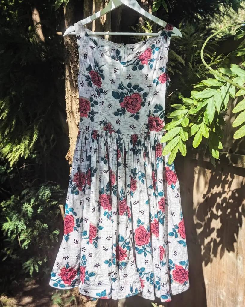 A rose-print 1950s dress with a huge circle skirt. 