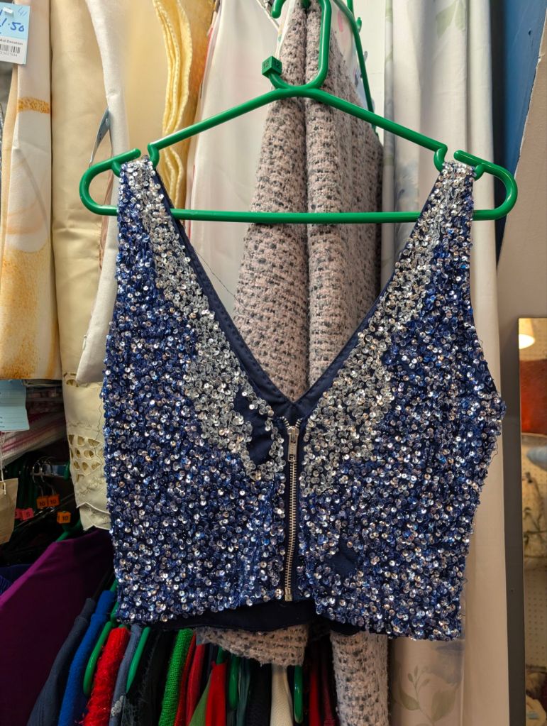 A bodice missing sequins